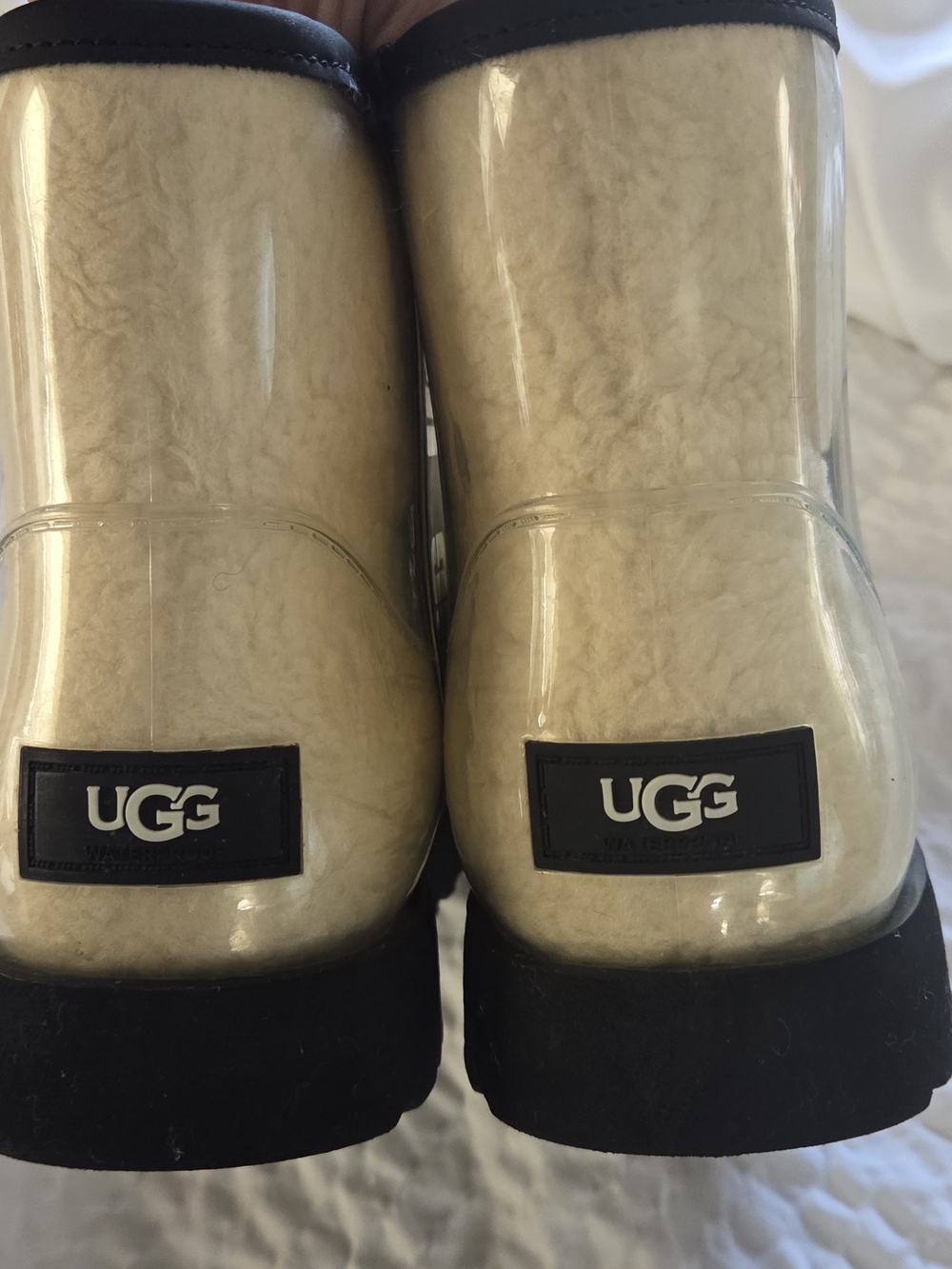 UGG Cream Shearling Heeled Boots with Black Trim